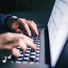 Typing on Laptop
