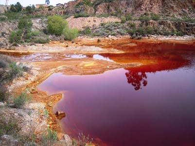 Red lagoon at the Lousal mine in Portugal
