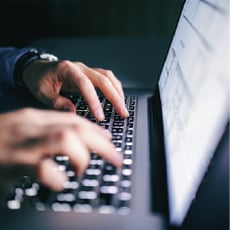 Typing on Laptop 